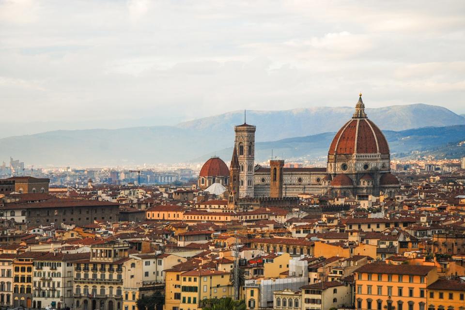 Cathedral of Santa Maria del Fiore in sunset, photo taken in Piazza Michelangelo, Florence, Italy