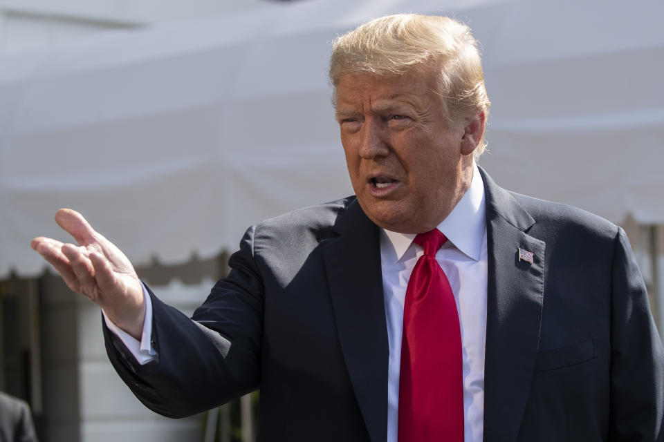 President Donald Trump speaks with reporters before departing on Marine One on the South Lawn of the White House, Tuesday, June 23, 2020, in Washington. (AP Photo/Alex Brandon)