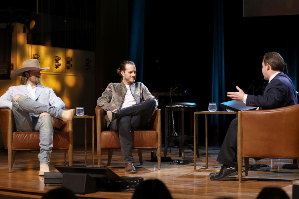 NASHVILLE, TENNESSEE - FEBRUARY 06: (L-R) Brian Kelley and Tyler Hubbard of Florida Georgia Line and Executive Senior Director of Editorial and Interpretation of the Country Music Hall of Fame, Michael Gray speak onstage during an interview for Florida Georgia Line: Mix It Up Strong Exhibit opening day at Country Music Hall of Fame and Museum on February 06, 2022 in Nashville, Tennessee. (Photo by John Shearer/Getty Images for Country Music Hall of Fame and Museum)