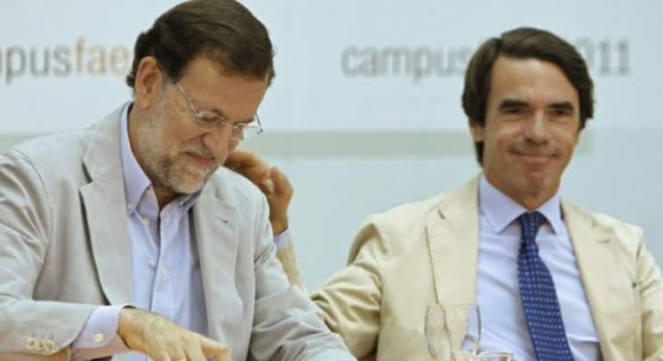 Mariano Rajoy y José María Aznar en un acto de las FAES