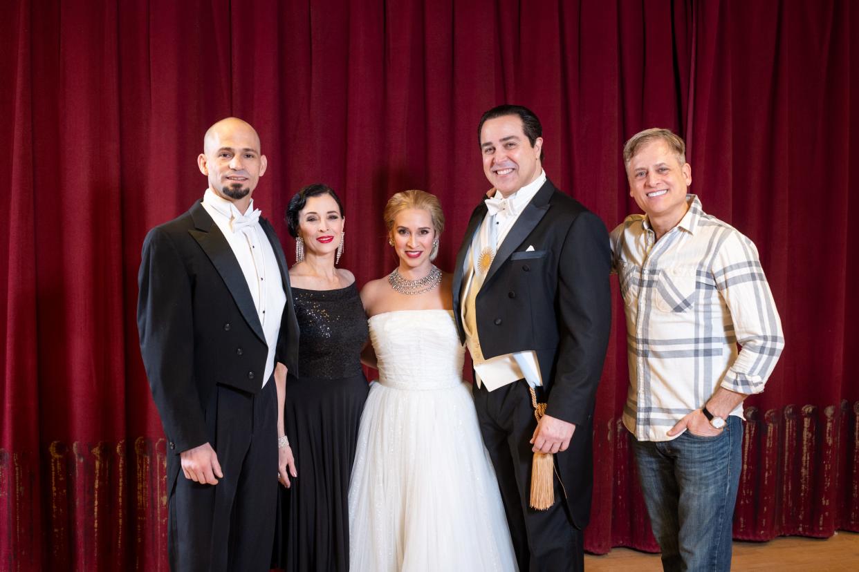 Tango dancers Mariano Logiudice and Guillermina Quiroga, actors Rána Roman and Andrew Varela, and director-choreographer Gustavo Zajac take a break during rehearsals for Skylight Music Theater's "Evita."