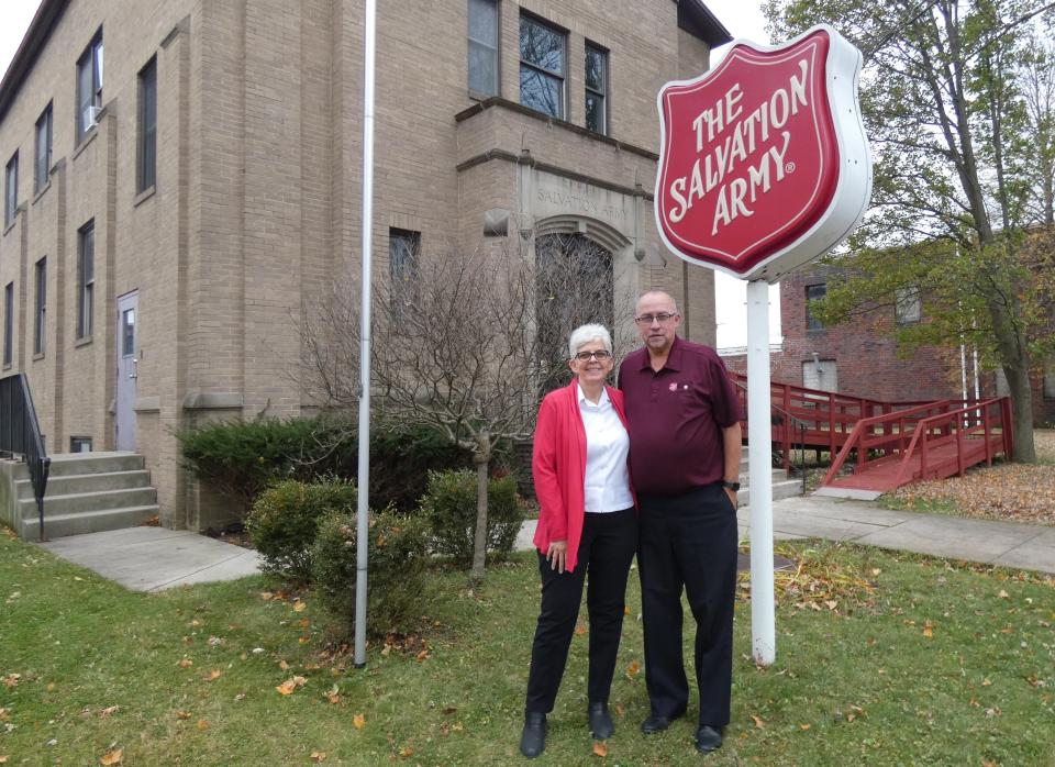 Majors Debbra and Tom Grace, commanders at the Bucyrus Salvation Army in Bucyrus, in front of their current location. The Salvation Army is planning to move into the former Maplewood Assisted Living facility.