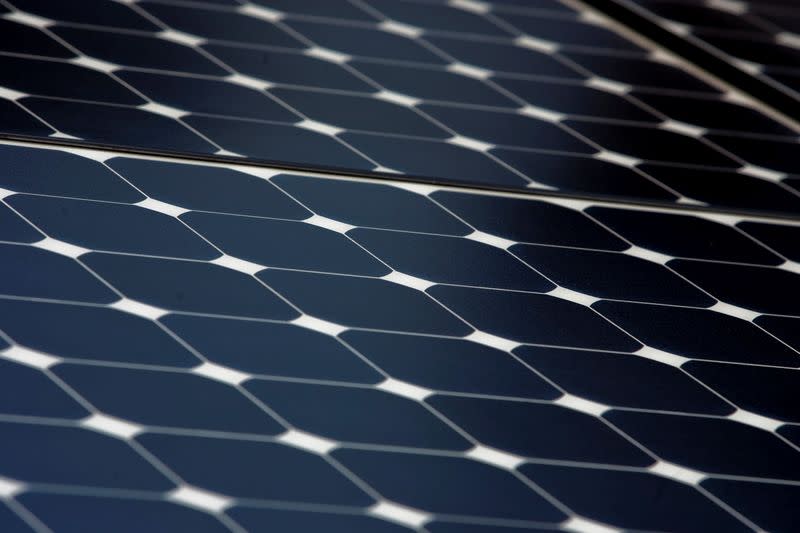 FILE PHOTO: Solar panels sit on the roof of SunPower Corporation in Richmond