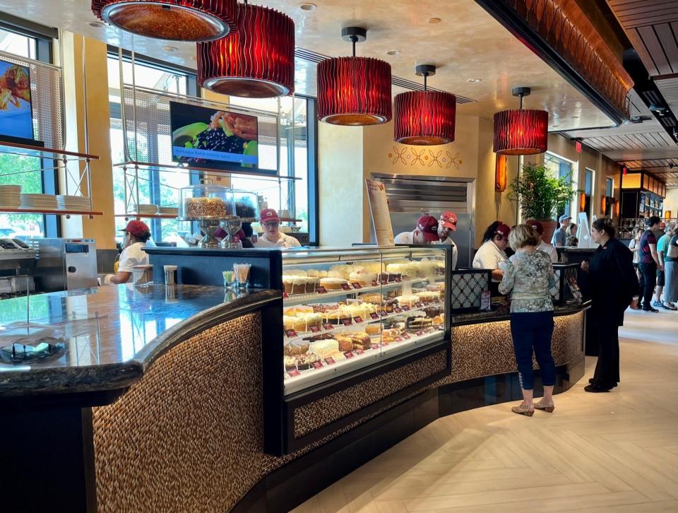 Pick up dessert to go at The Cheesecake Factory's counter to the right of the entry in the Coconut Point restaurant.