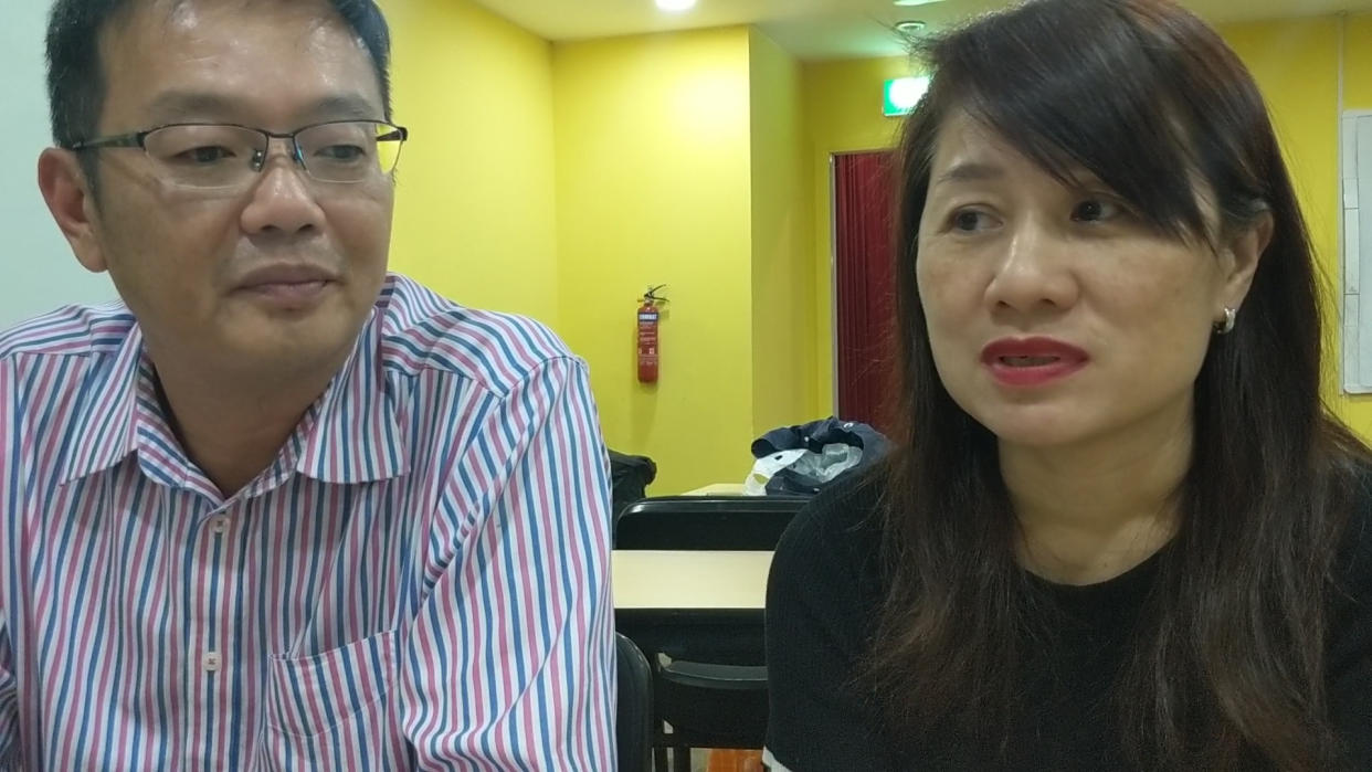 Desmond Chan, 50, and Lim Teck Kheng, 51, parents of the late 3SG Gavin Chan who died in a military training accident last September. (Video screencap)