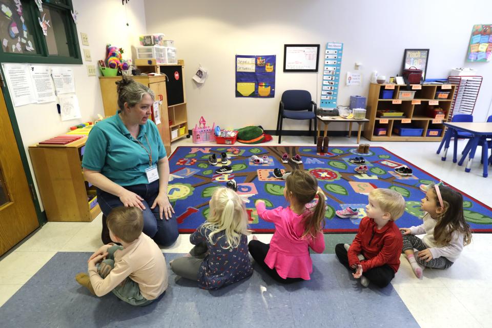 Lora Meverden lines up a group of children to take them outside to play Monday, February 26, 2024, at the YMCA Child Learning Center in Appleton, Wis. Appleton 
Dan Powers/USA TODAY NETWORK-Wisconsin.