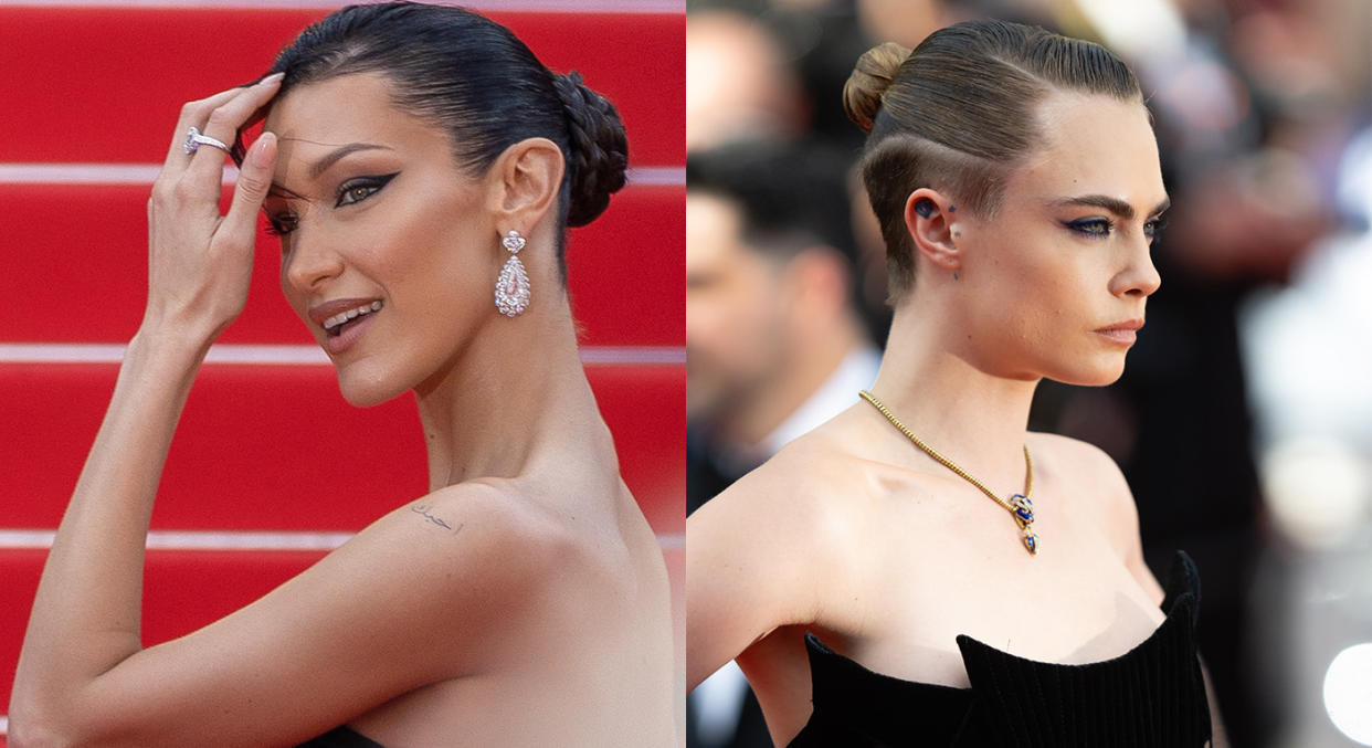 Bella Hadid and Cara Delebvingne had the same idea, wearing all-black on the Cannes red carpet. (Getty Images)