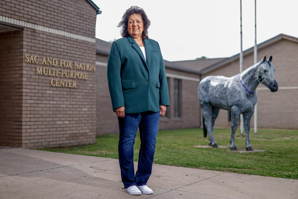 Edwina Butler-Wolfe, the first woman to serve a full term as governor of the Absentee Shawnee Tribe, is pictured May 21 in front of the Sac and Fox Nation Community Service in Shawnee.