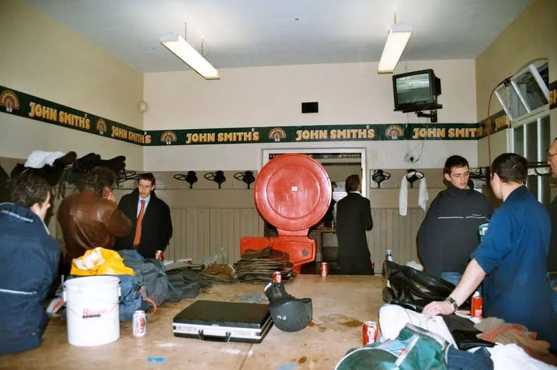 Past photos of what it used to look like inside the Weighing Room at Aintree Racecourse which is now McCoy's Bar