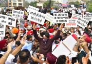 AMRITSAR, INDIA - SEPTEMBER 23: Congress leader Navjot Singh Sidhu along with his supporters march during a protest rally against the farm bills from Bhandari bridge to Hall gate on September 23, 2020 in Amritsar, India. (Photo by Sameer Sehgal/Hindustan Times via Getty Images)