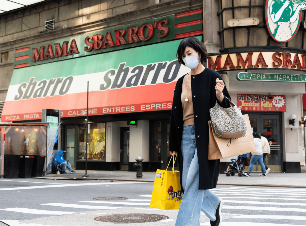 Exterior of Sbarro, Times Square, New York City, Woman Walking Along Crosswalk in the Foreground