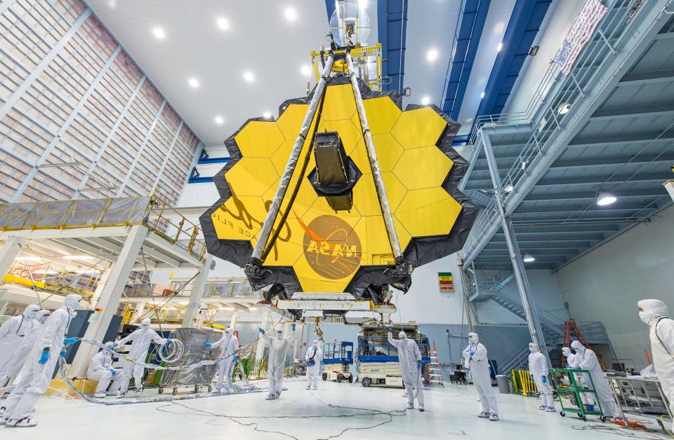 NASA technicians lifted the telescope using a crane and moved it inside a clean room at NASA’s Goddard Space Flight Center in Greenbelt, Maryland.