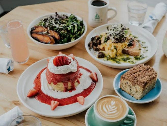 The Harissa Grain Bowl, Scrambled Egg Toast and Strawberries and Cream Stack at Drift Coffee & Kitchen.