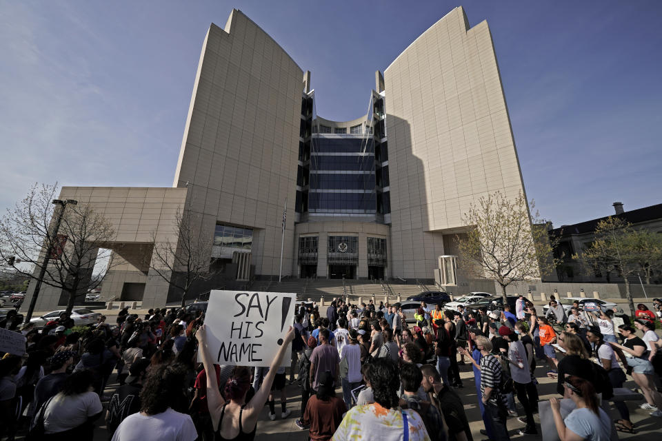 People gather at a rally to support Ralph Yarl, Tuesday, April 18, 2023, across from the United States Courthouse in Kansas City, Mo. Yarl, a Black teenager, was shot last week by a white homeowner when he mistakenly went to the wrong address to pick up his younger brothers. (AP Photo/Charlie Riedel)