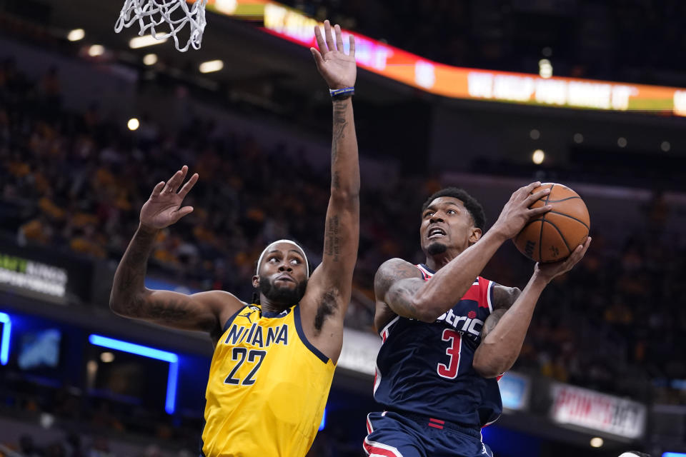 Washington Wizards' Bradley Beal shoots against Indiana Pacers' Isaiah Jackson (22) during the first half of an NBA basketball game Wednesday, Oct. 19, 2022, in Indianapolis. (AP Photo/Michael Conroy)