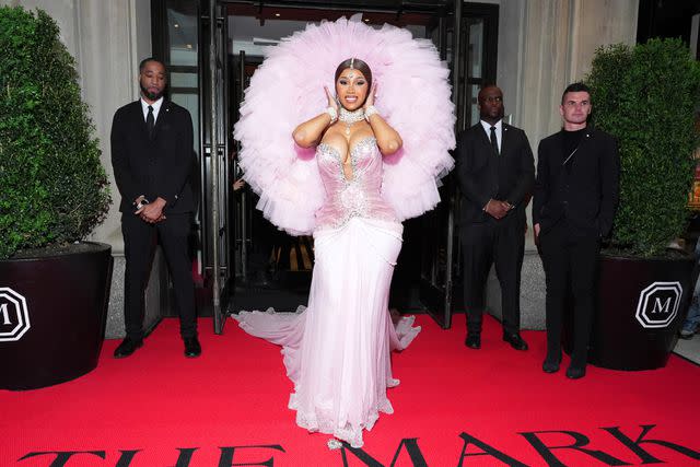 <p>Ilya S. Savenok/Getty Images for The Mark</p> Cardi B departs from The Mark Hotel for the 2023 Met Gala.