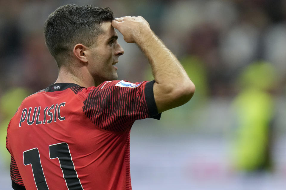 AC Milan's Christian Pulisic celebrates scoring his side's opening goal during a Serie A soccer match between AC Milan and Lazio, at the San Siro stadium in Milan, Italy, Saturday, Sept. 30, 2023. (AP Photo/Luca Bruno)