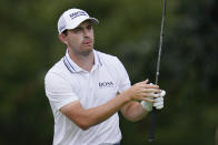 Patrick Cantlay watches his tee shot on the second hole during the final round of the BMW Championship golf tournament, Sunday, Aug. 29, 2021, at Caves Valley Golf Club in Owings Mills, Md. (AP Photo/Julio Cortez)