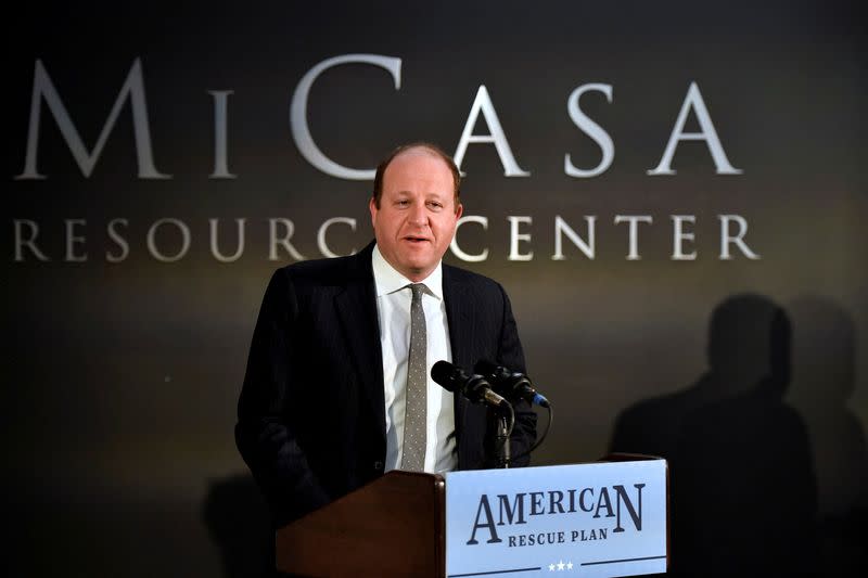 FILE PHOTO: Colorado Governor Jared Polis speaks about the American Rescue Plan Act on the one year anniversary of the law during his visit to Mi Casa Resource Center in Denver