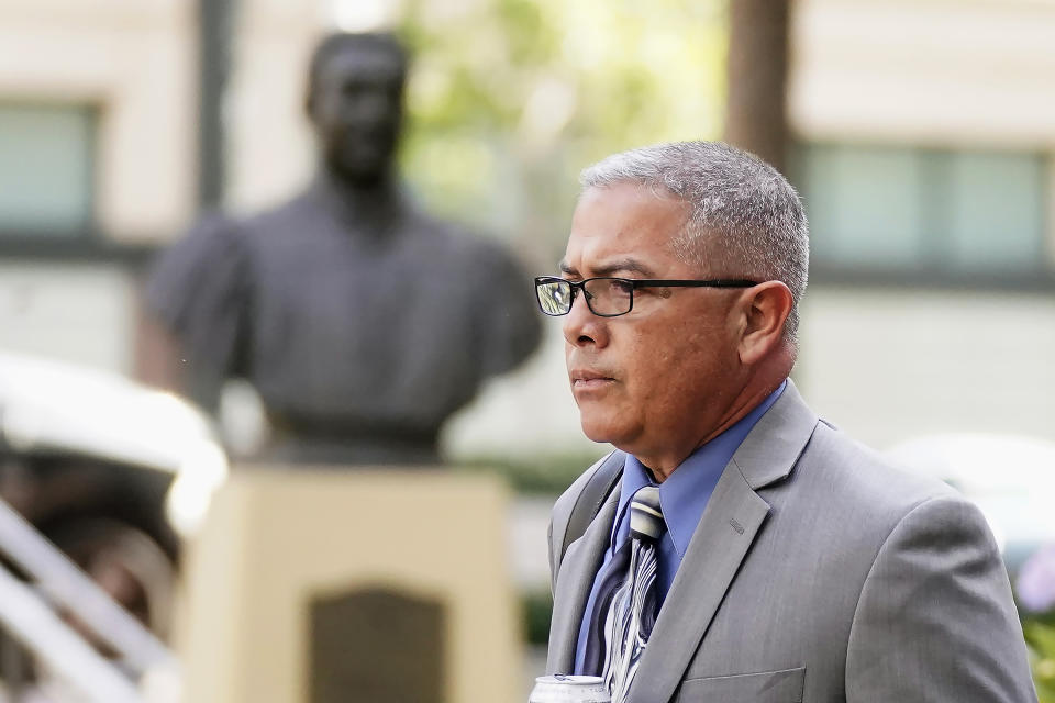 FILE - Ray J. Garcia leaves the Federal Courthouse in Oakland, Calif., on Nov. 28, 2022. The former warden of an abuse-plagued federal women's prison in the San Francisco Bay Area was sentenced Wednesday, March 22, 2023, to nearly six years in prison for sexually abusing incarcerated women. (AP Photo/Jeff Chiu, File)