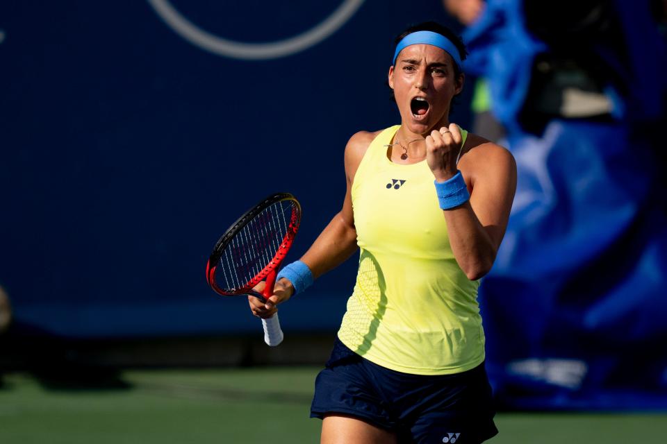 Caroline Garcia reacts to winning a point against Elise Mertens during the second set of their match in the Western & Southern Open at the Lindner Family Tennis Center in Mason, Ohio, on Thursday, Aug. 18, 2022. Garcia defeated Mertens 6-4, 7-5. 