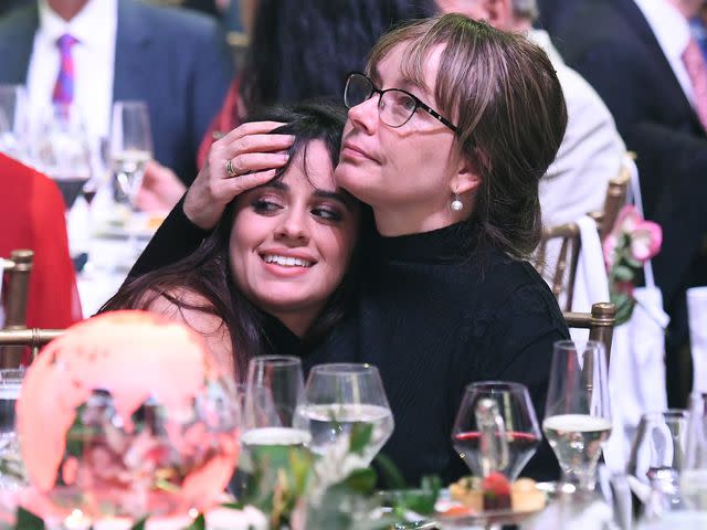 <p>Noam Galai/Getty</p> Camila Cabello and Sinuhe Estrabao at Save the Children The Centennial Gala: Changing The World for Children gala in 2019.