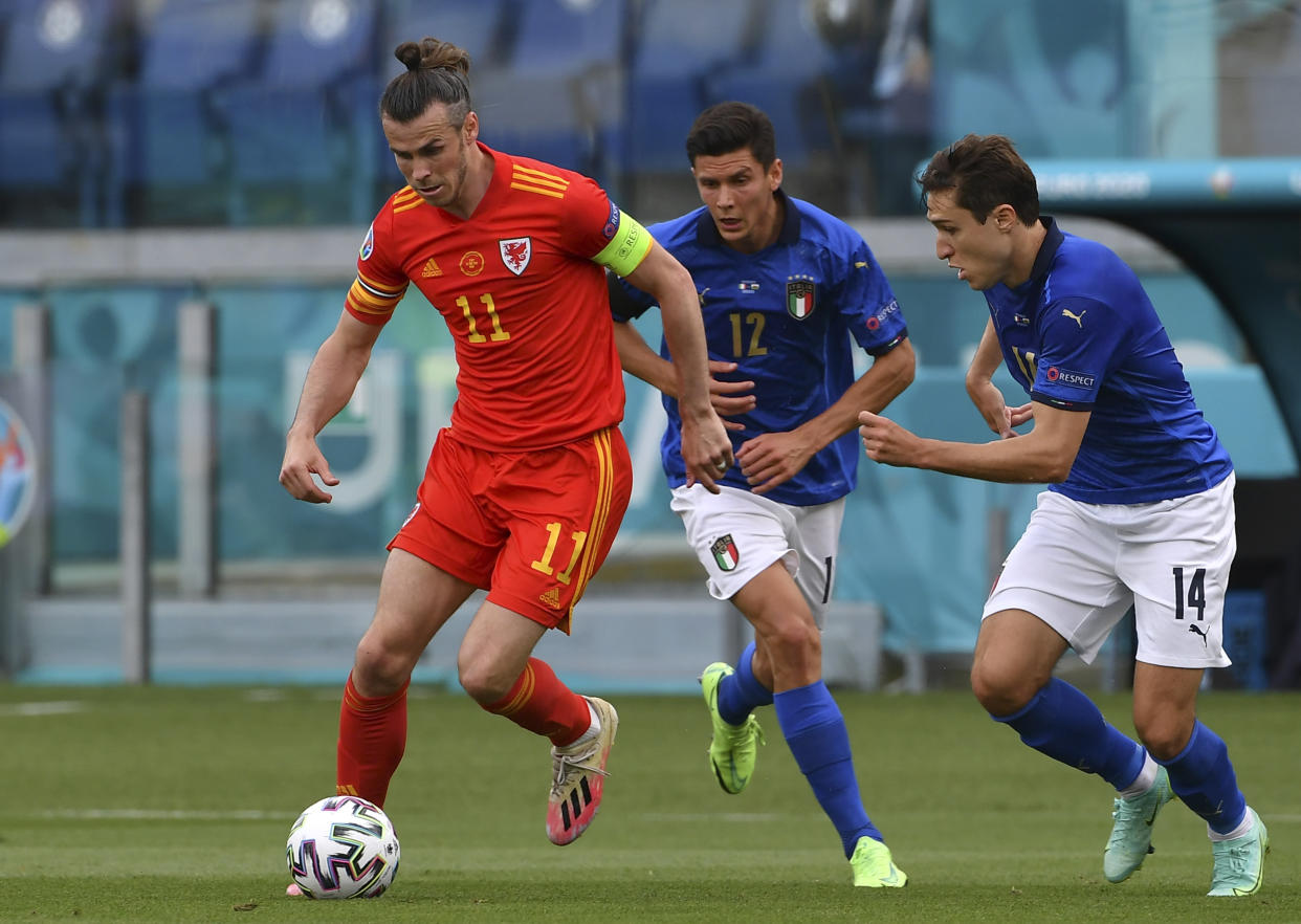 Gareth Bale in action against Italy at the Olympic Stadium in Rome.