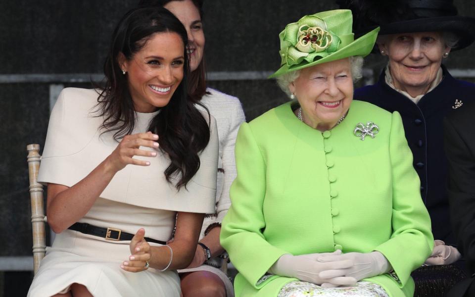 Meghan and the Queen at the opening of the new Mersey Gateway Bridge, in Widnes, Cheshire in June 2018 - Danny Lawson/PA