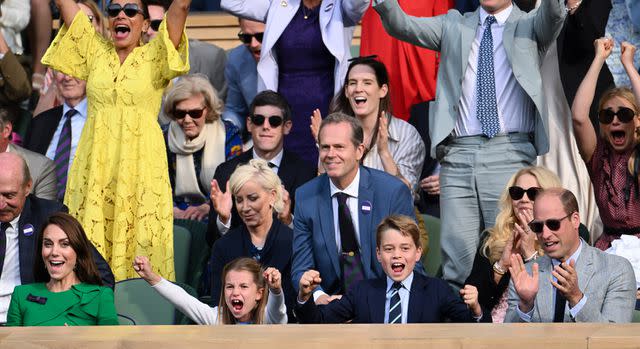 <p>Karwai Tang/WireImage</p> Kate Middleton, Princess Charlotte, Prince George and Prince William cheer at Wimbledon.