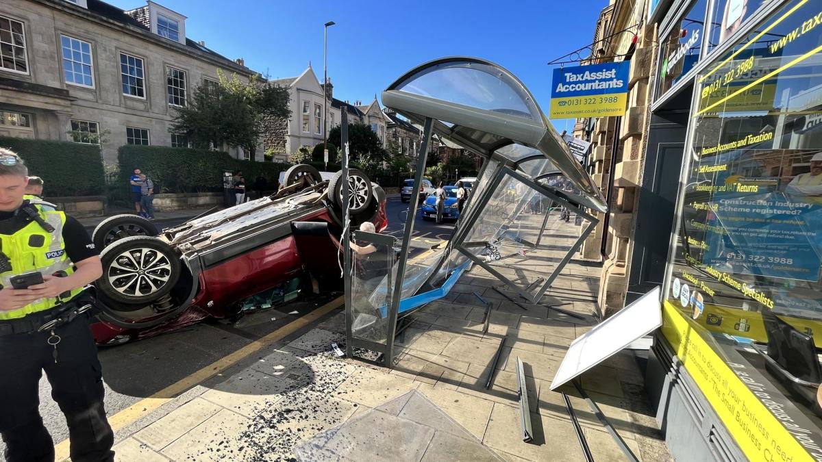 Edinburgh motorist hospitalised after Easter Road smash leaves car on roof  - Edinburgh Live