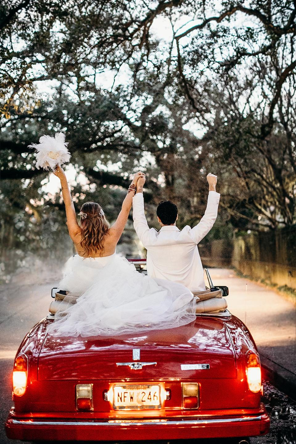 “Because I always wanted to roll up to my own wedding in some hot wheels,” Mia shares.