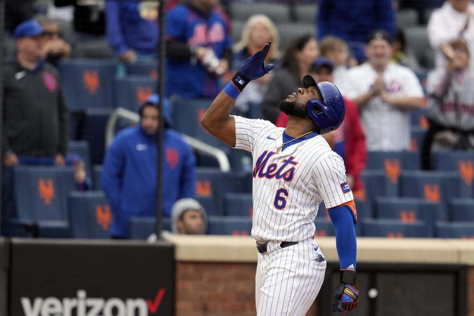 New York Mets' Starling Marte reacts as he reaches home plate after hitting a two-run home run during the third inning of a baseball game against the Pittsburgh Pirates, Wednesday, April 17, 2024, in New York. (AP Photo/Mary Altaffer)