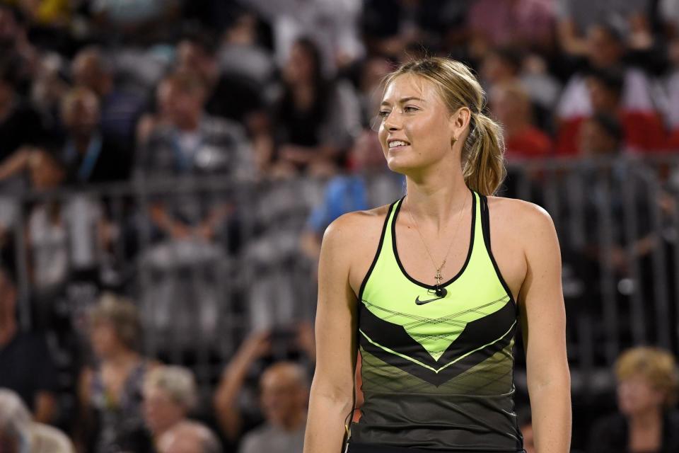 Sharapova smiles during the World Team Tennis Smash Hits charity event benefiting the Elton John AIDS Foundation at Caesars Palace on October 10, 2016: Ethan Miller/Getty Images