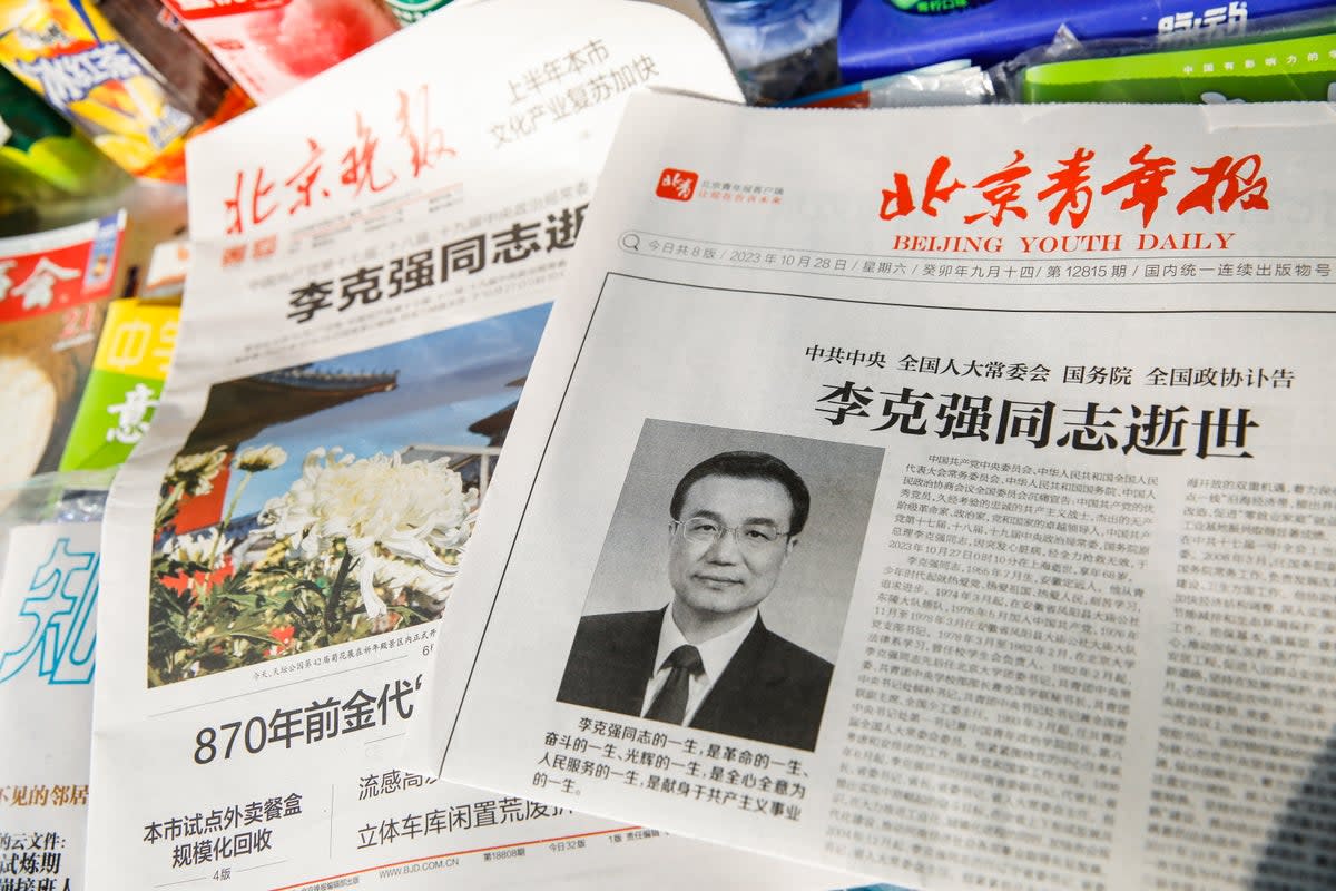 A newspaper front page shows former Chinese leader Li Keqiang’s obituary at a newsstand in Beijing (EPA)