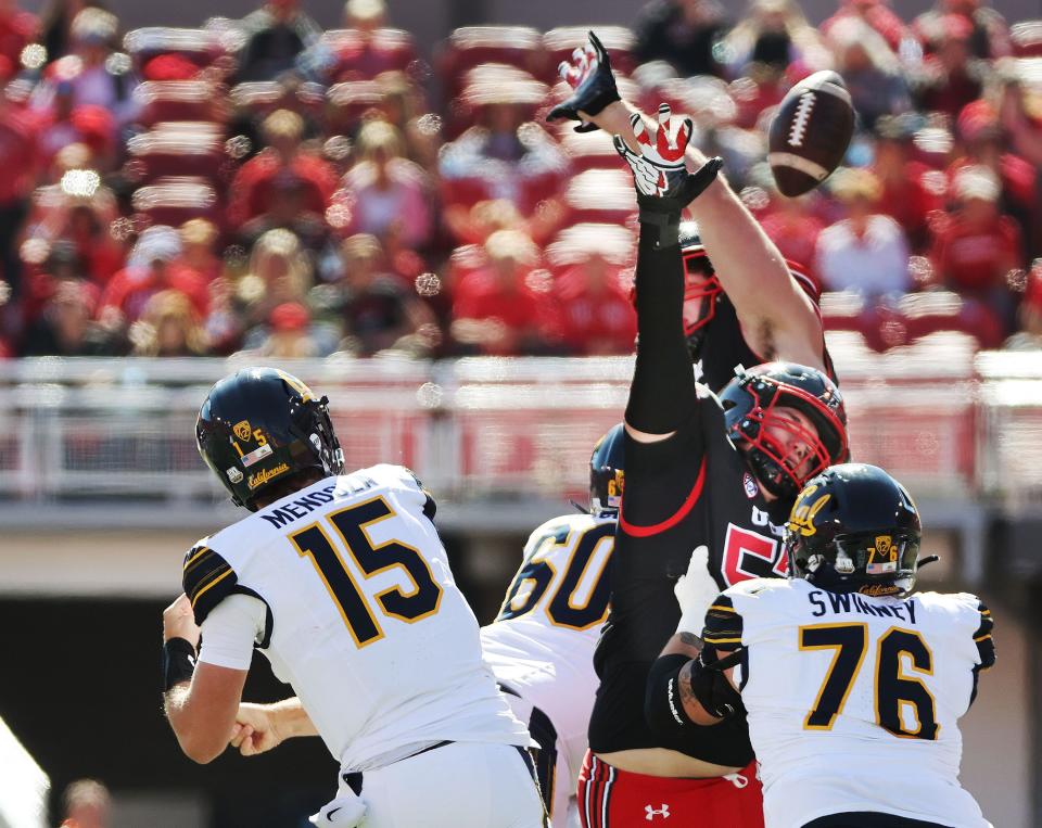 Utah Utes defensive tackle Keanu Tanuvasa (57) blocks the pass by California Golden Bears quarterback Fernando Mendoza (15) in Salt Lake City on Saturday, Oct. 14, 2023. It lead to an inception. | Jeffrey D. Allred, Deseret News