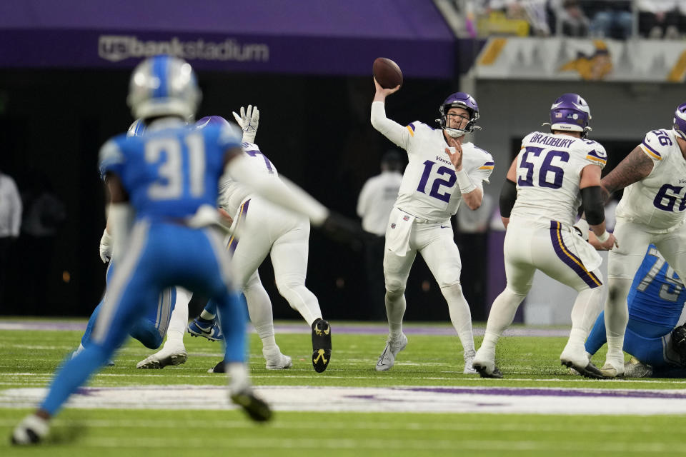 Minnesota Vikings quarterback Nick Mullens (12) throws a pass during the first half of an NFL football game against the Detroit Lions, Sunday, Dec. 24, 2023, in Minneapolis. (AP Photo/Abbie Parr)