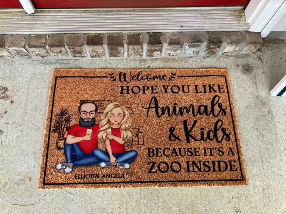 This doormat at the Turbeville farm in Marion County welcomes visitors to the adventure of family life with seven adopted siblings ages 4-15.