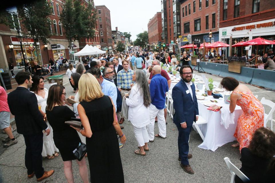 The Chamber Collaborative of Greater Portsmouth’s annual “street.life!” celebration was transformed into a much larger, 900-person lobster dinner on the length of Congress Street in honor of the city's 400th anniversary Wednesday, Aug. 16, 2023.