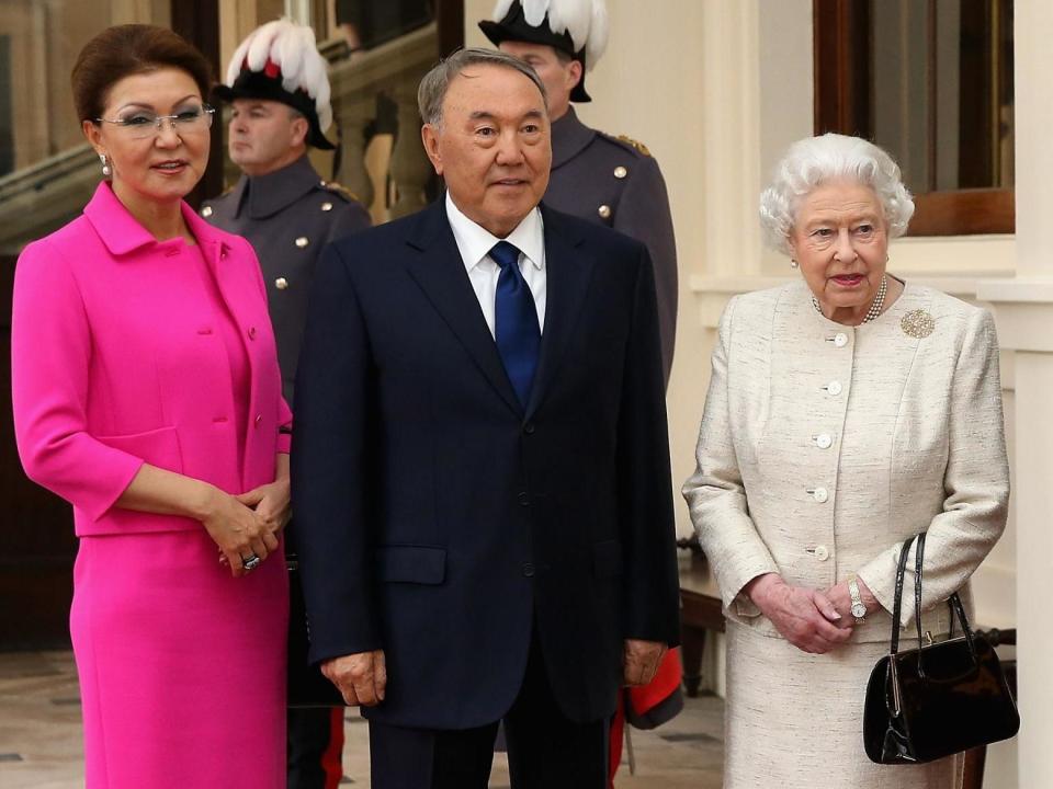 Dariga Nazarbayeva and her father president Nursultan Nazarbayev with Queen Elizabeth at Buckingham Palace in November 2015: Chris Jackson/AFP via Getty Images