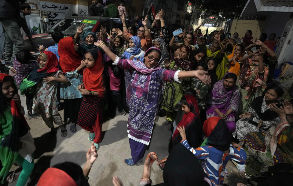 Supporters of Bilawal Bhutto Zardari, Chairman of Pakistan People's Party dance to celebrate their party victory in initial results of the country's parliamentary election, in Karachi, Pakistan, Friday, Feb. 9, 2024. (AP Photo/Fareed Khan)