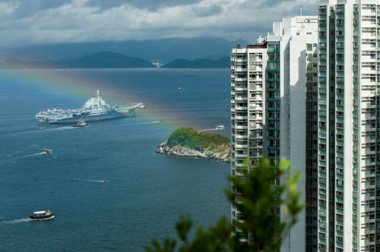 The 305 metre-long (1,000 feet) Liaoning, a secondhand Soviet ship built nearly 30 years ago and commissioned in 2012, arrived in Hong Kong early Friday, as a rainbow appeared overhead