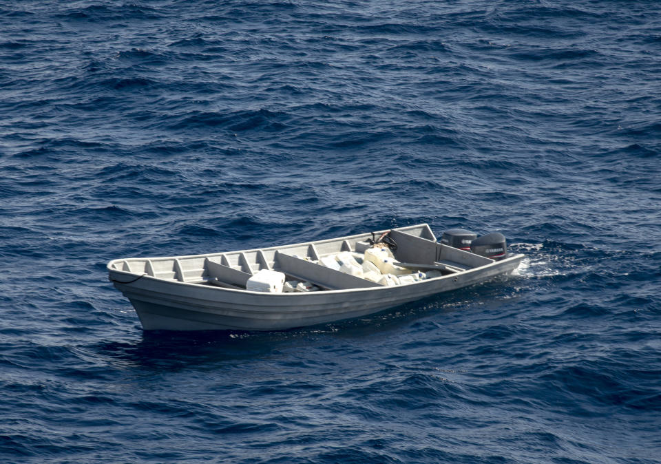 In this Nov. 27, 2019 photo provided by the U.S. Coast Guard, a suspected drug-smuggling vessel floats in international waters of the Eastern Pacific Ocean after Coast Guard Cutter Bertholf, boarding teams interdicted the boat while patrolling the region. An estimated $312 million worth of cocaine seized from smugglers in the eastern Pacific Ocean has been brought to San Diego. About 18,000 pounds (8,165 kilograms) of the drug was offloaded Wednesday, Dec. 18, 2019, from the Coast Guard cutter Bertholf. (Petty Officer 2nd Class Paul Krug/U.S. Coast Guard via AP)