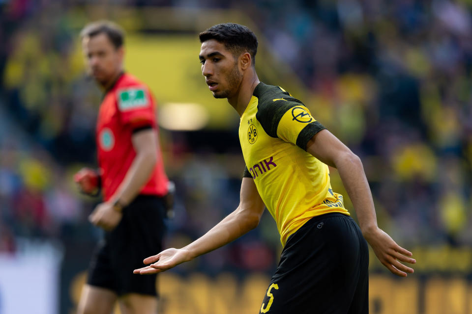DORTMUND, GERMANY - MARCH 30: Achraf Hakimi of Borussia Dortmund looks on during the Bundesliga match between Borussia Dortmund and VfL Wolfsburg at Signal Iduna Park on March 30, 2019 in Dortmund, Germany. (Photo by TF-Images/Getty Images)