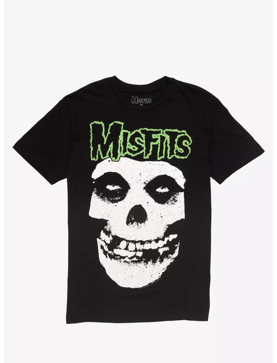 black t-shirt with green text and skull graphic