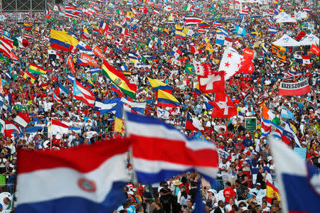 People attend a vigil with Pope Francis at Saint Paul II Metro Park during World Youth Day in Panama City, Panama January 26, 2019. REUTERS/Alessandro Bianchi