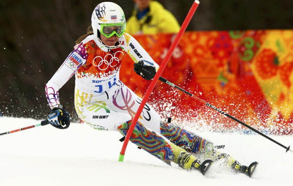 Sarka Strachova of the Czech Republic clears a gate during the first run of the women's alpine skiing slalom event at the 2014 Sochi Winter Olympics at the Rosa Khutor Alpine Center February 21, 2014. REUTERS/Ruben Sprich (RUSSIA - Tags: SPORT SKIING OLYMPICS)