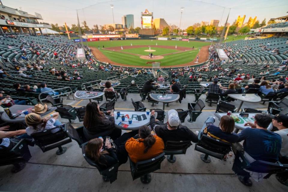 Baseball fans watch a Sacramento River Cats game Tuesday, April 9, 2024, at Sutter Health Park.