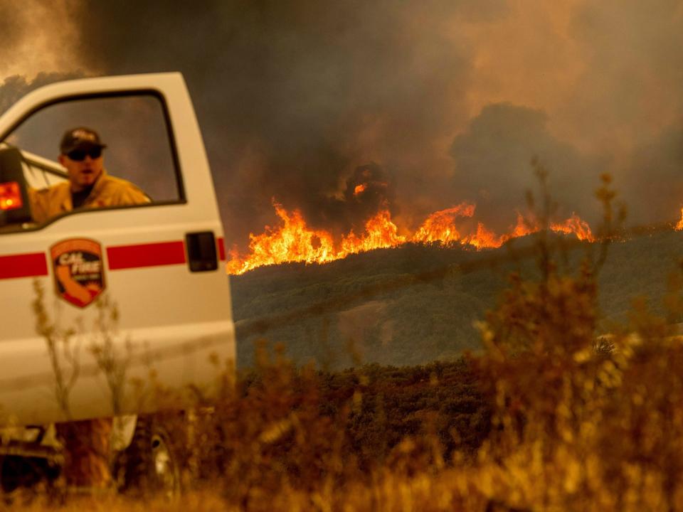 California wildfire: State's biggest blaze on record expected to burn for rest of month