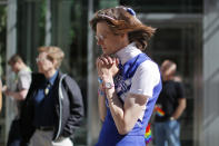 <p>Party attendees join in a moment of silence for the victims of the mass shooting at Orlando’s Pulse nightclub during a Pride Month block party in Boston, Massachusetts, June 12, 2016. (REUTERS/Brian Snyder) </p>