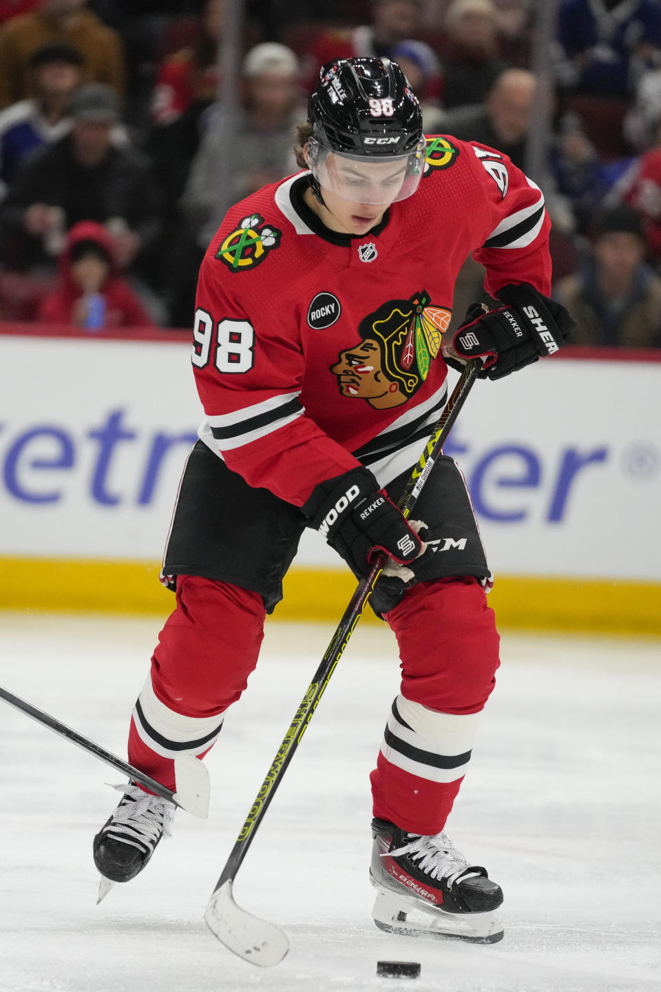 Chicago Blackhawks center Connor Bedard handles the puck during the second period of an NHL hockey game against the Toronto Maple Leafs Friday, Nov. 24, 2023, in Chicago. (AP Photo/Erin Hooley)